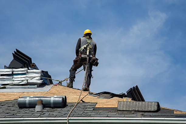 Professional Roofing technician working in Macksburg, IA
